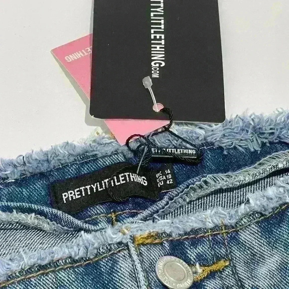 NWT Pretty little thing mid rise, flared ripped jeans  size US 10 - Picture 6 of 8